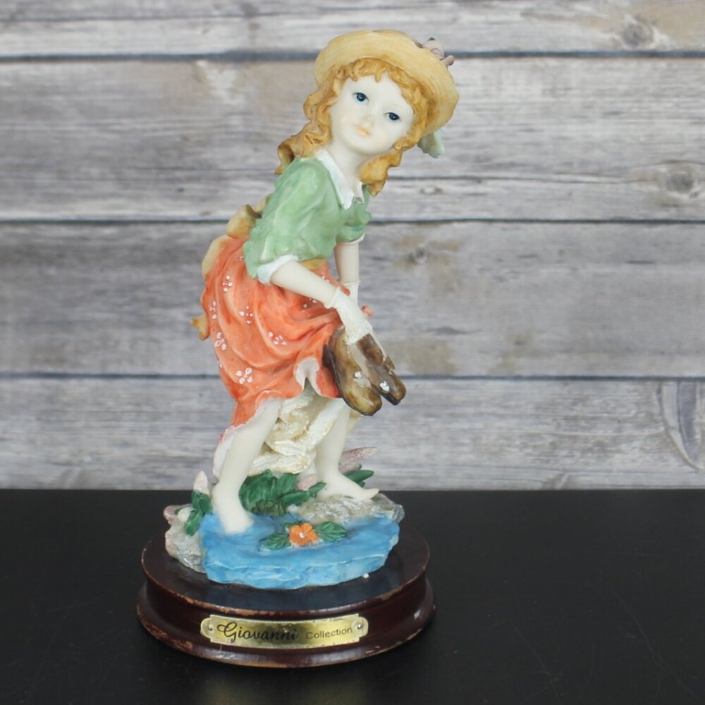Giovanni Collection Victorian Girl Walking with Shoes on Pond 8 inches tall